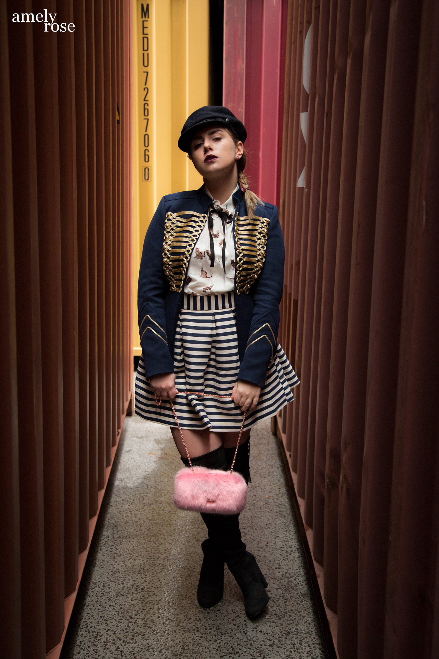 amely rose a german fashion blogger wearing a marine uniform as a summerlook with a catprint blouse and hat