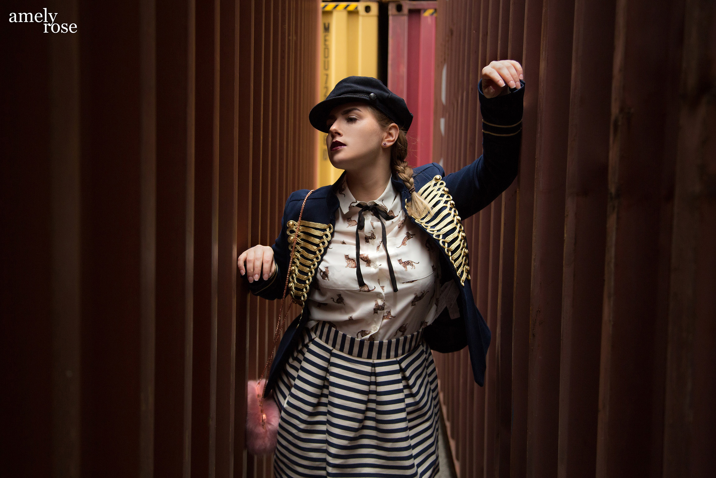 amely rose a german fashion blogger wearing a marine uniform as a summerlook with a catprint blouse and hat