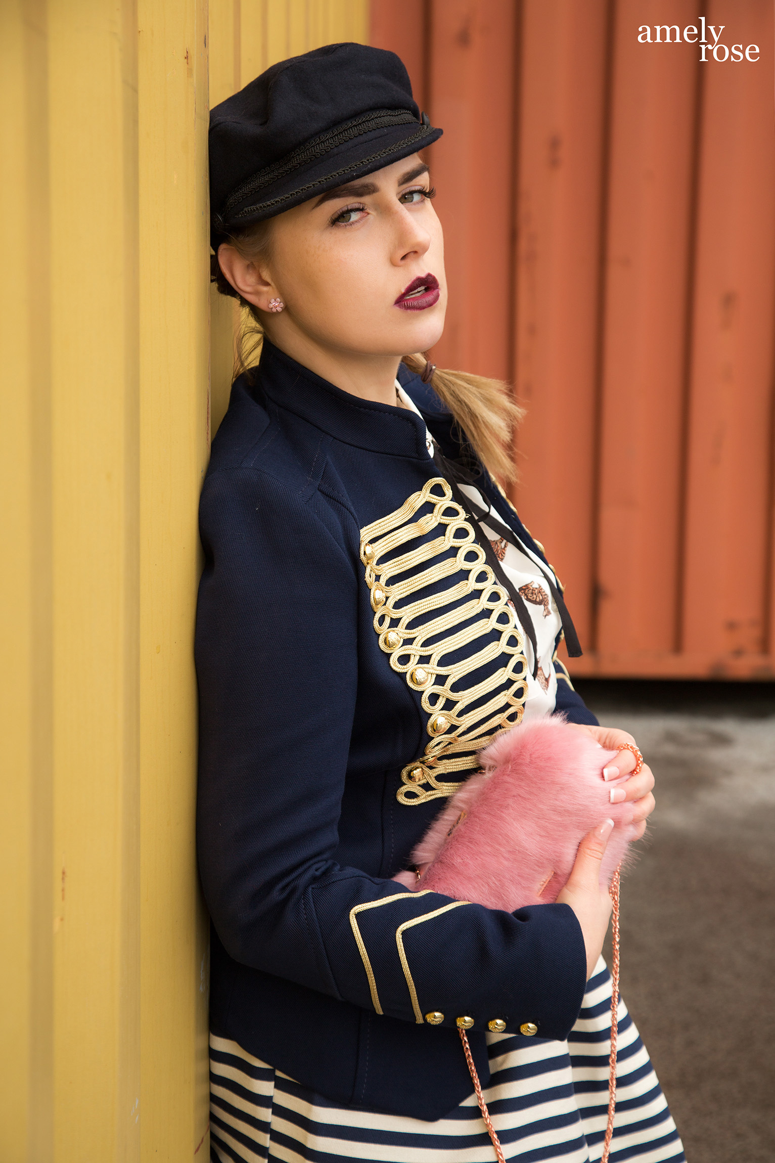amely rose a german fashion blogger wearing a marine uniform as a summerlook with a catprint blouse and hat