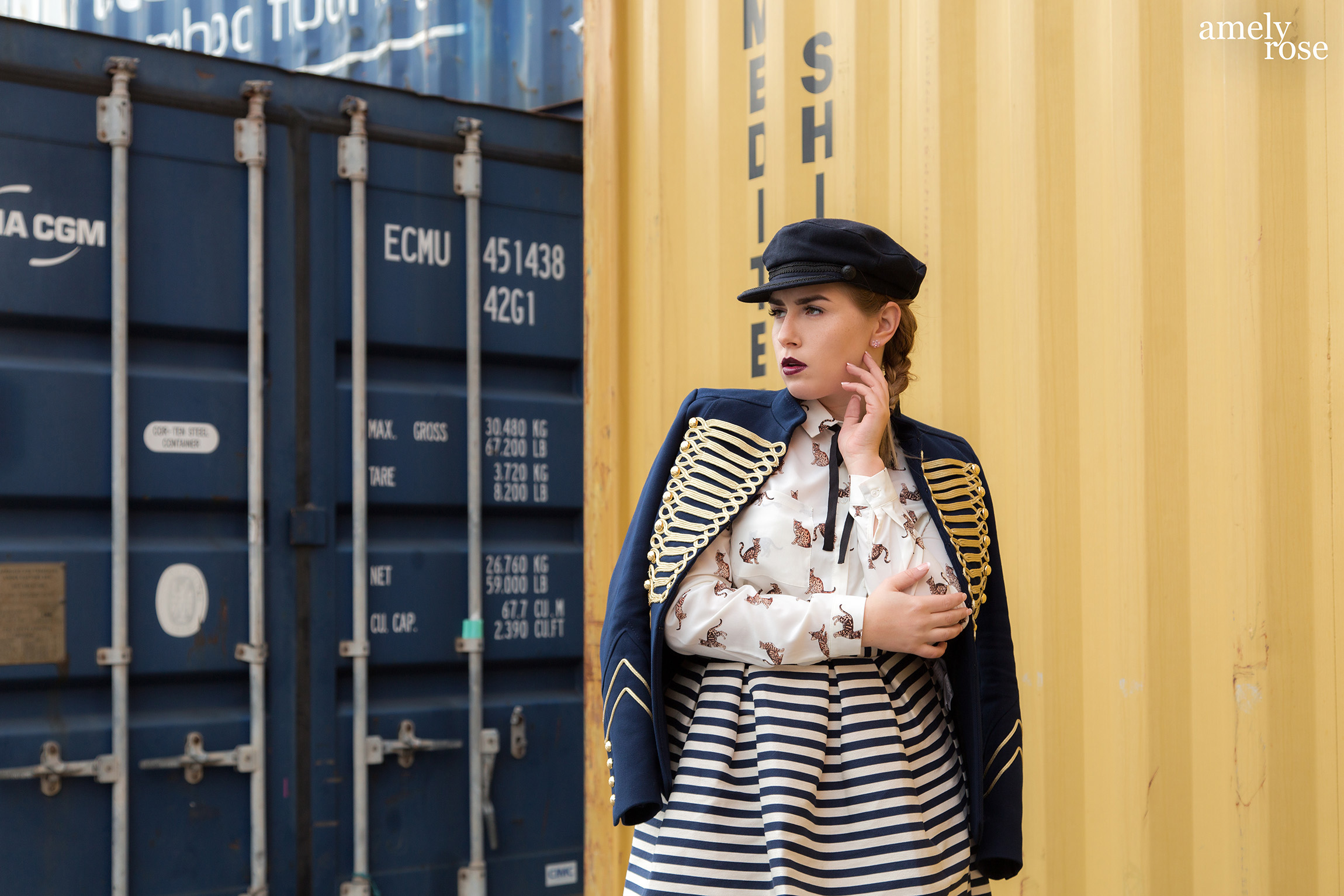 amely rose a german fashion blogger wearing a marine uniform as a summerlook with a catprint blouse and hat